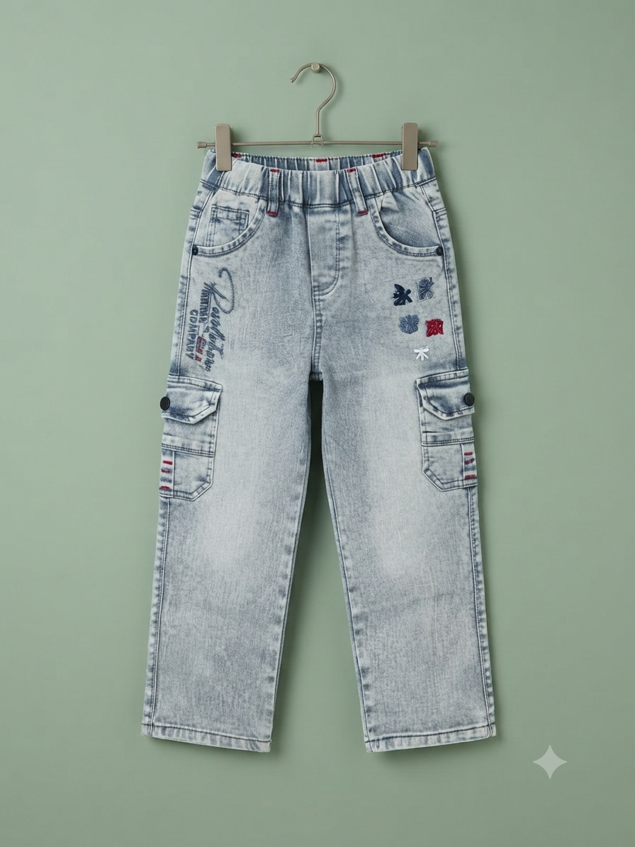 Stylish boys cargo denim pants featuring utility pockets, embroidered details, and a comfortable elastic waistband.