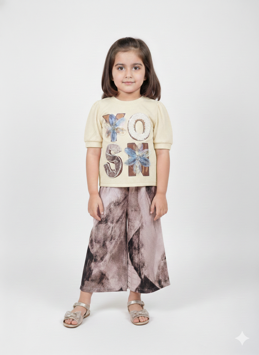 Stylish Girls Black Top And Printed Wide Leg Pants Set With Trendy Floral Appliqué