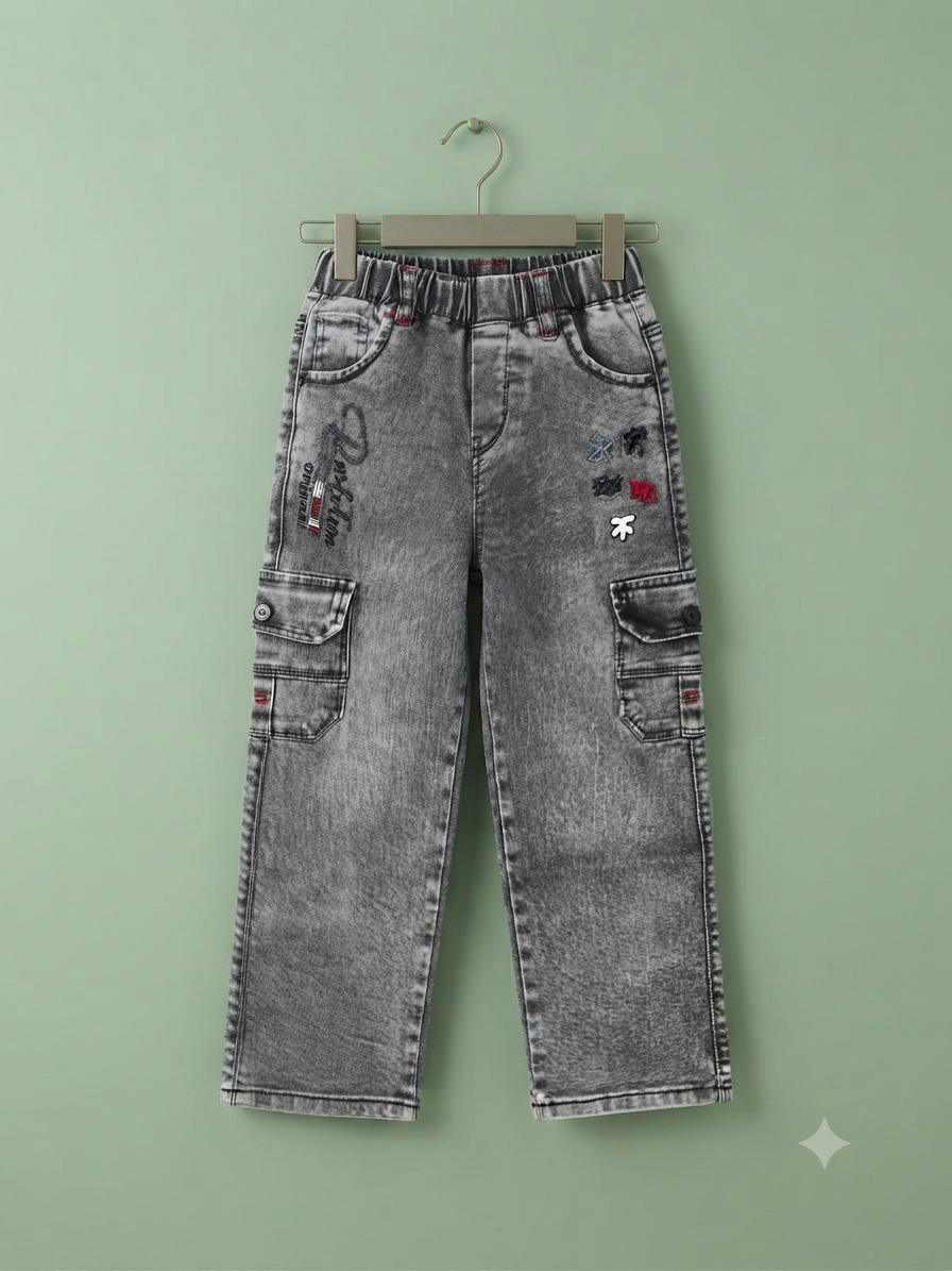 Stylish boys cargo denim pants featuring utility pockets, embroidered details, and a comfortable elastic waistband.