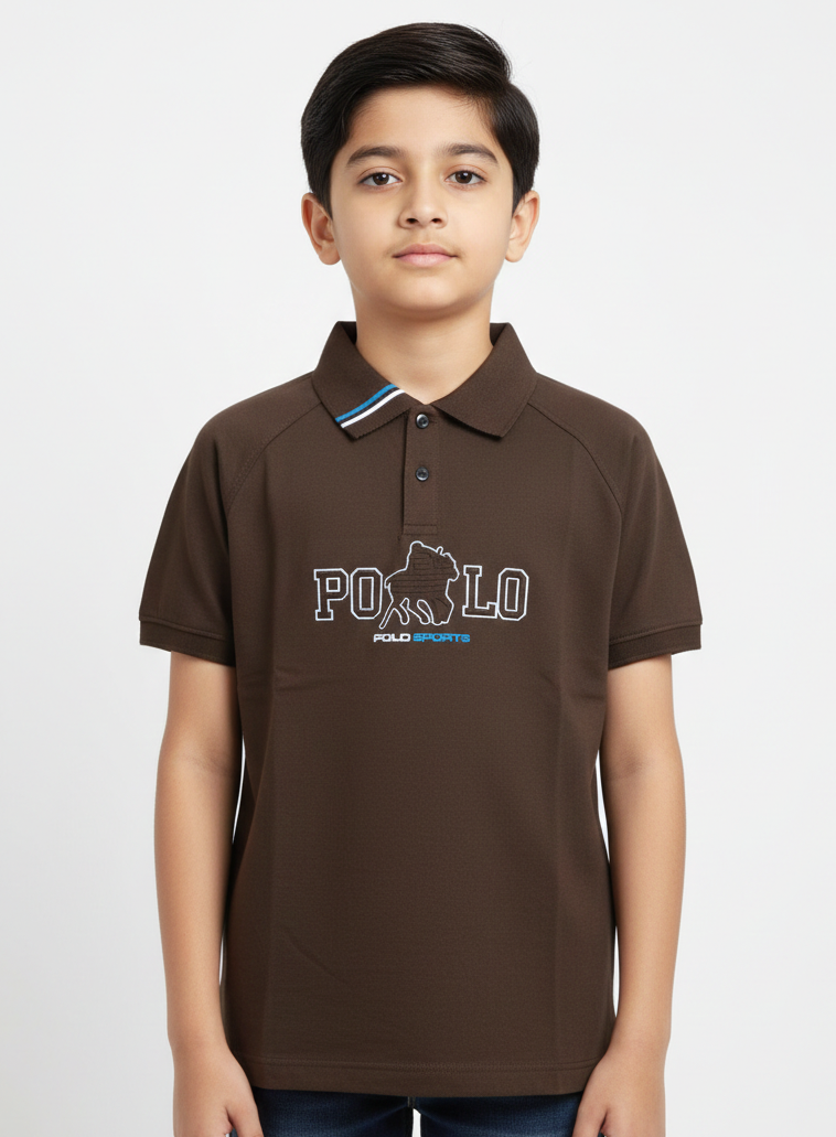 A Modern Portrait Of A Young Boy Wearing A Multicolored Sage Green Graphic Polo Shirt